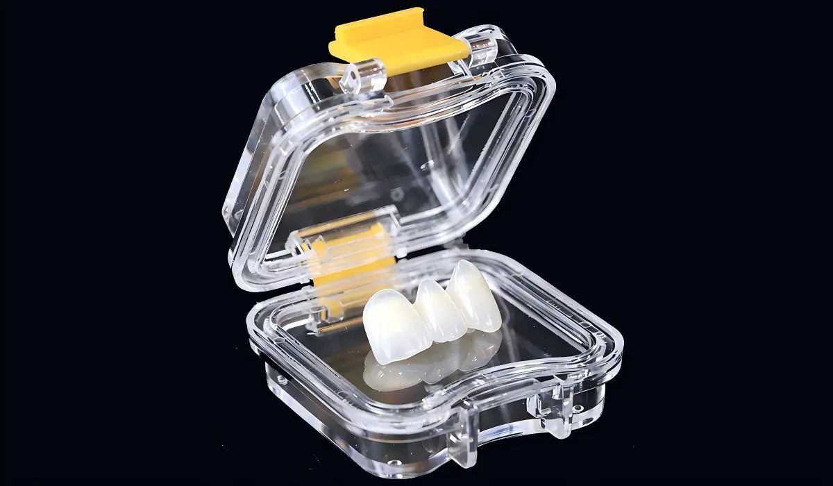 Three-unit zirconia crown in transparent protective dental box